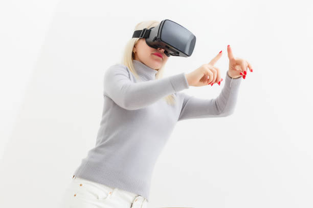 istock Woman using the virtual reality headset, virtual glasses 1278017695