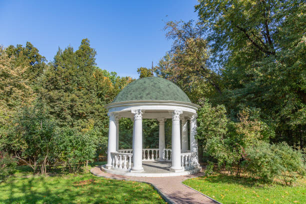 istock White stone garden house in a summer park 1278017803