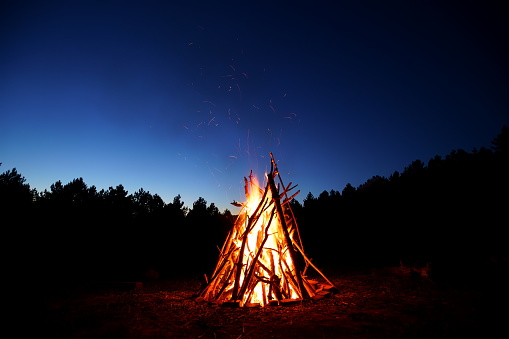 Camp fire by the night in the great desert of Sinai, Egypt.