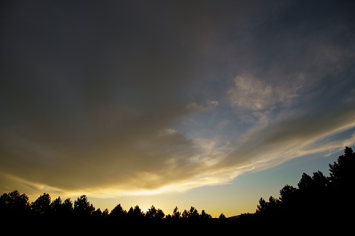 Thunderstorm in the Bavarian Forest with dark clouds and bright sheet lightning