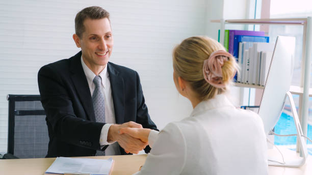 istock Job seeker and manager handshake in job interview 1278023015