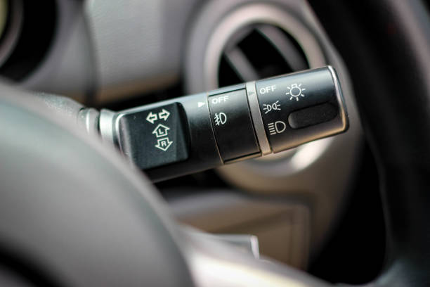 istock Switch off lights in a car. close-up Car integrated turning indicator with headlight switch toggle. 1278025855