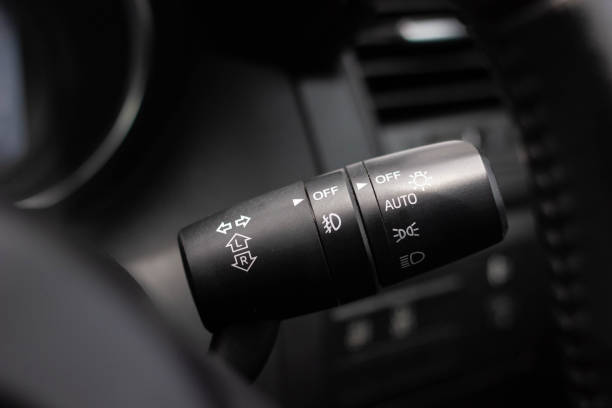 istock Switch off lights in a car. close-up Car integrated turning indicator with headlight switch toggle. 1278026095