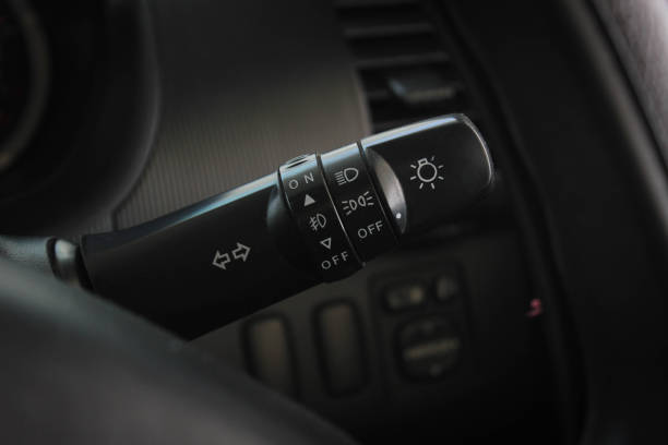 istock Switch off lights in a car. close-up Car integrated turning indicator with headlight switch toggle. 1278026369