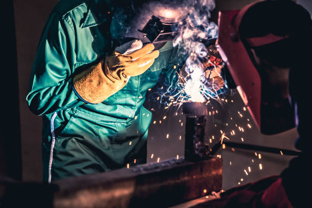 istock Metal welding steel works using electric arc welding machine 1278027713