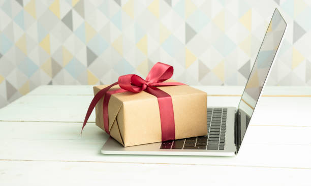 istock holding red gift box about shopping online concept. 1278028114