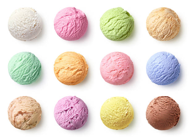 Set of different ice cream scoops or balls Set of ice cream scoops of different colors and flavours isolated on white background, top view scoop shape stock pictures, royalty-free photos & images