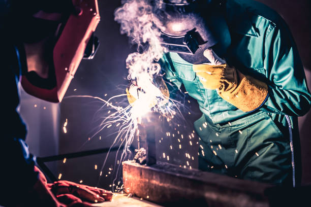 istock Metal welding steel works using electric arc welding machine 1278033764