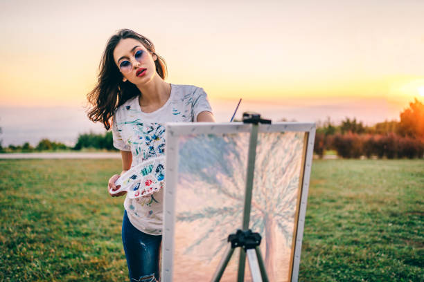 istock Young female artist in nature 1278034071