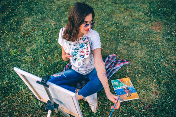 istock Young female artist in nature 1278034218