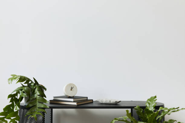 istock Stylish scandinavian home interior with design wooden commode, books, decorations, copy space , plants and elegant personal accessories in modern home decor. Template. 1278038071