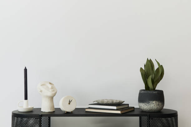 istock Stylish scandinavian home interior with design wooden commode, books, decorations, copy space and elegant personal accessories in modern home decor. Template. 1278038079