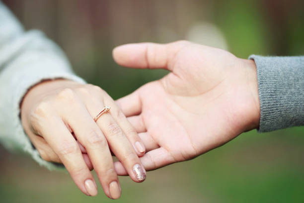 istock Couple hand shake with a little love on Valentines day 1278038117