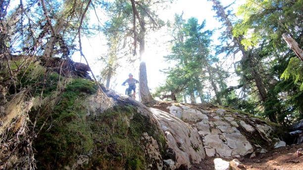 istock Mountain biker rides down rock slab 1278038728