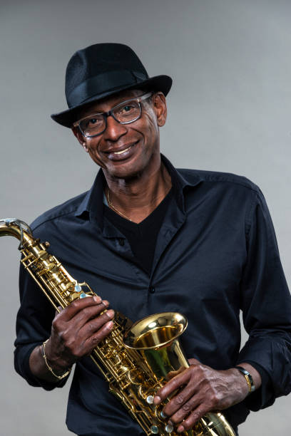istock Musician with saxophone and big smile 1278041631