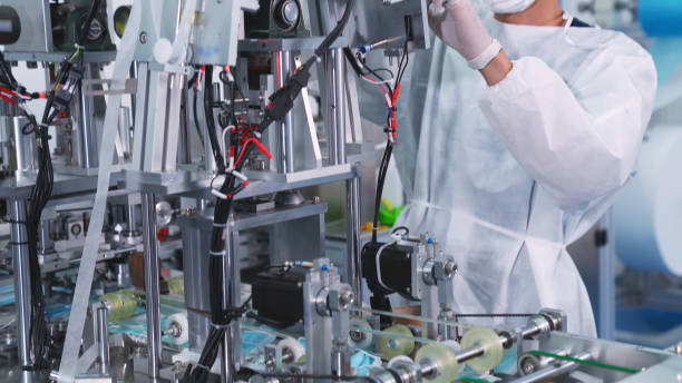 istock Face mask production line in modern factory 1278043905