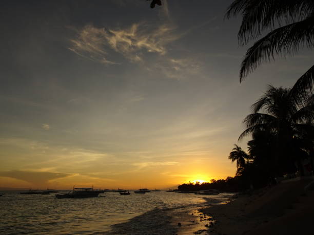 istock Sunset by the sea 1278050092