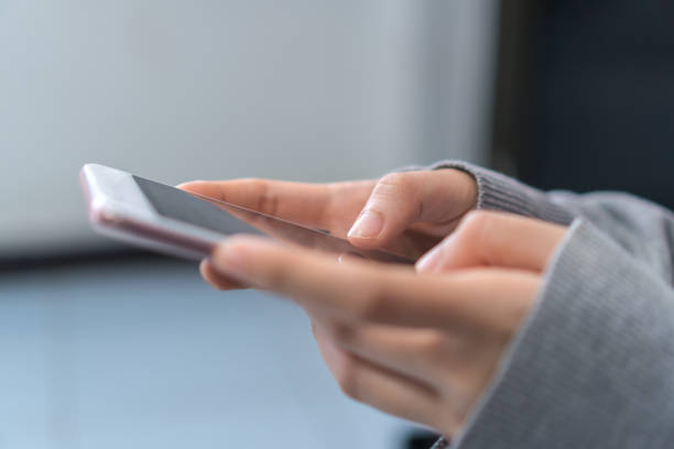 istock Woman student using smartphone application for studying homework in online lesson from home when social distancing or quarantine, self-isolation when Covid-19 outbreak pandemic 1278052589