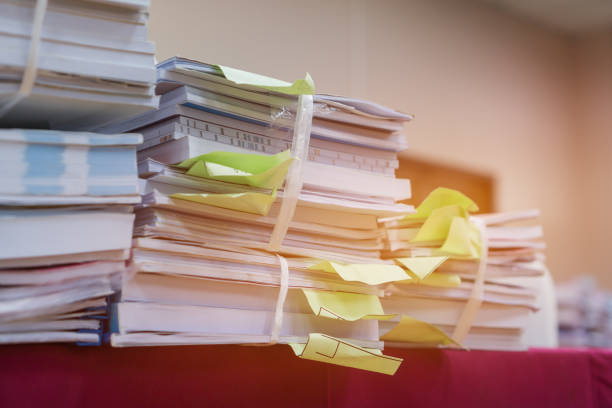 istock Bunch of education documents or report teacher after approve and checking from admistrator, Annual Reports document for evaluation in student study in university office 1278055730