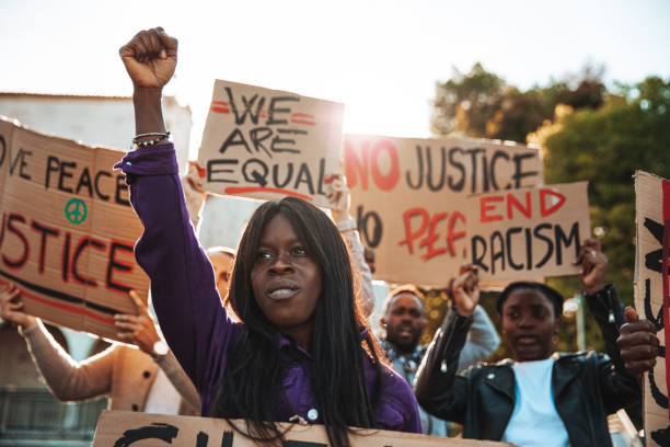 People united against racism. Anti-Racism protest People united against racism. Anti-Racism protest. Protestors holding hand-made signs on cardboards. discrimination stock pictures, royalty-free photos & images