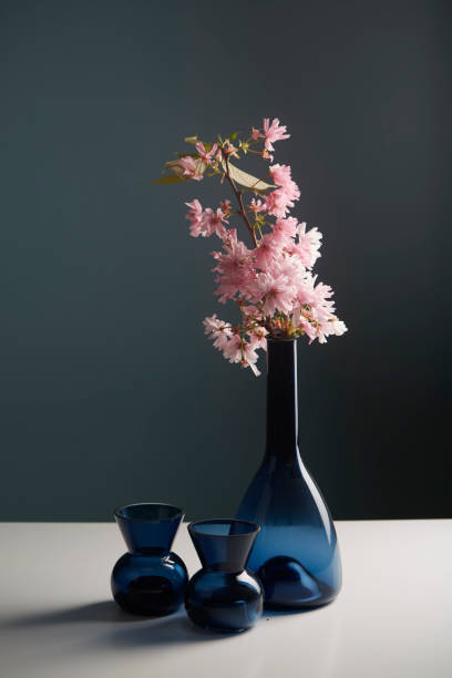 istock Pink flower in a blue vase 1278058324