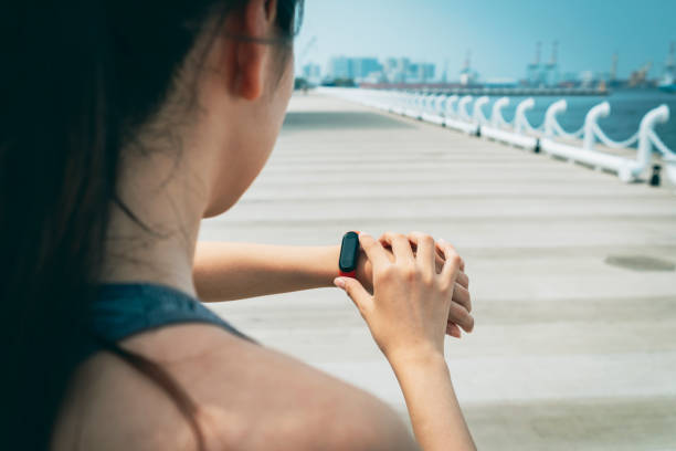 istock Young sporty woman checking her smart watch 1278059522