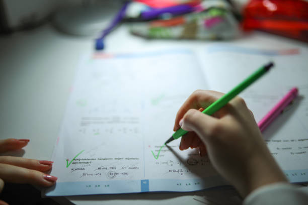 istock Girl Doing Homework And Taking Exams At Home 1278063841