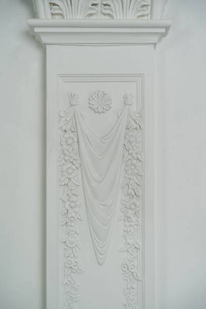 istock White ornament on a white wall. Architectural elements for interior wall design. High quality photo 1278065319