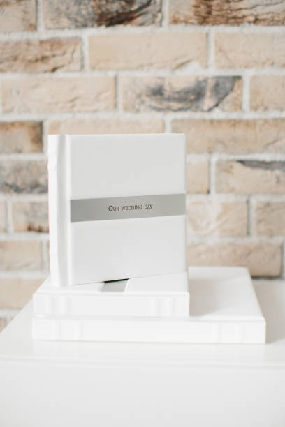 istock Faux leather white wedding photo books 1278065646