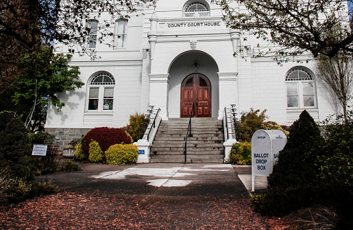 Benton County Courthouse was built in 1888 and is located in Corvallis Oregon.  Ballet drop box can be seen in right hand side of this image.