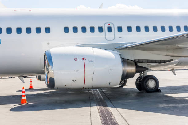 istock Aircraft engine, wing, landing gear and fuselage with portholes. 1278067462
