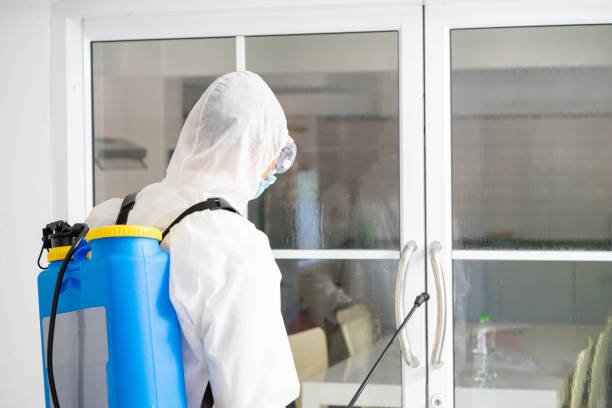 istock health care worker in white jumpsuit and protective face mask using spraying machine to disinfect virus pandemic.  Health care and midicine concept. New normal social distancing concept. 1278074209