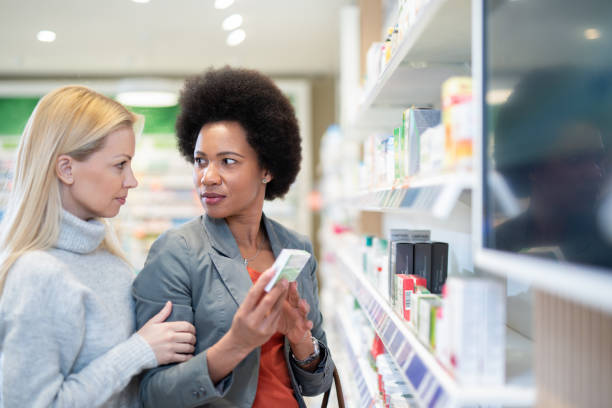 istock Friends shopping in a Pharmacy. 1278074735