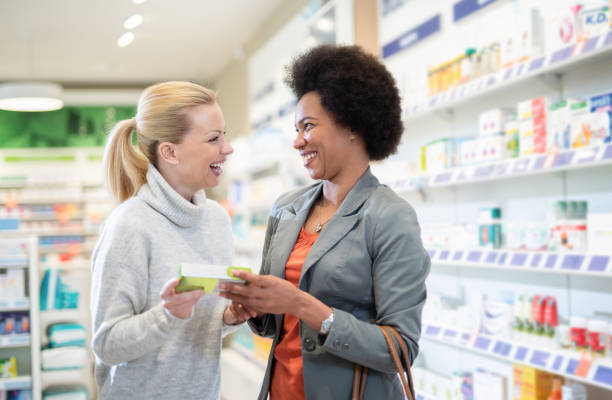 istock Friends shopping in a Pharmacy. 1278074798