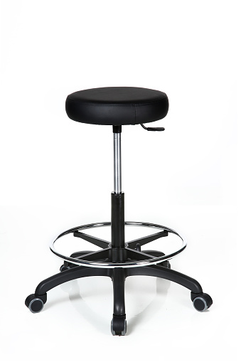 Shiny metal and black leather stool, isolated on white