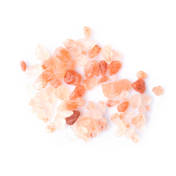 istock Himalayan pink salt raw crystals Isolated on White Background. 1278079878