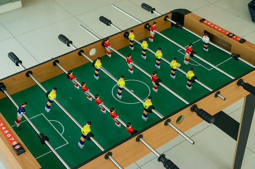 People playing table football