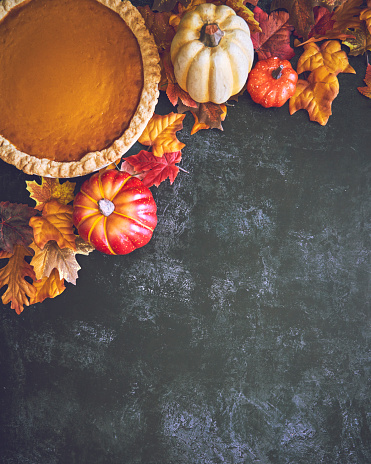 Pumpkin Pie for the Holidays on Rustic Background