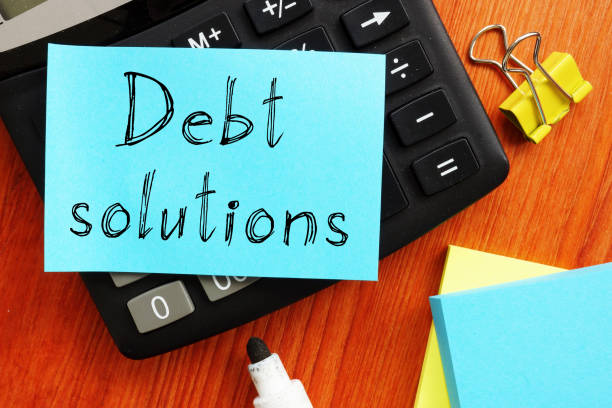 istock Debt solutions is shown on the conceptual business photo 1278094094