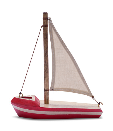 Red Wood Toy Sailboat Model Side View Isolated on White.