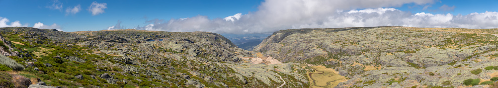 Panoramic view from the top of the mountains of the Serra da Estrela natural park, Star Mountain Range, low clouds and mountain landscape...