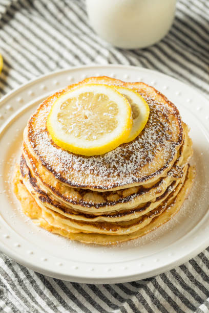 Homemade Lemon Ricotta Pancakes Homemade Lemon Ricotta Pancakes with Powdered Sugar Ricotta stock pictures, royalty-free photos & images