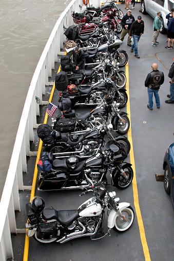 Cape May New Jersey, USA - September 18, 2020: Group of Harley Davidson motorcycles and riders on ferry boat crossing the Delaware Bay on their way to a biker rally in Ocean City Maryland’s Bike Fest.