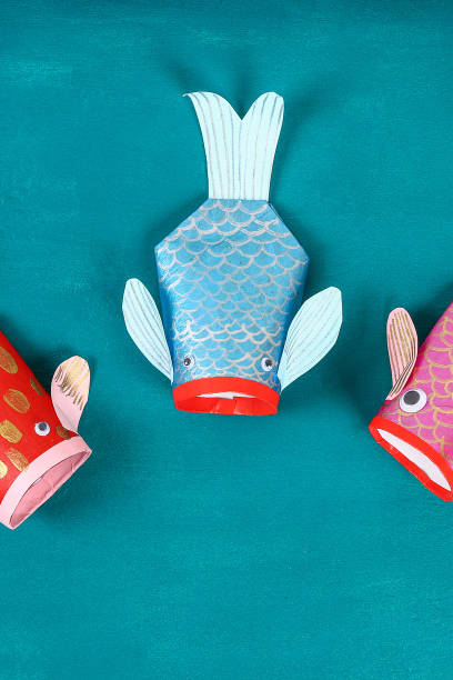 istock Diy koi carp fish on blue green background. 1278102727