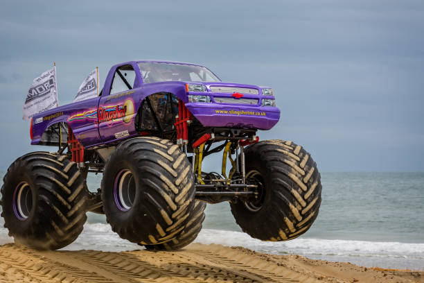 Monster truck airborne at the beach taken at Bournemouth, Dorset, UK stock photo