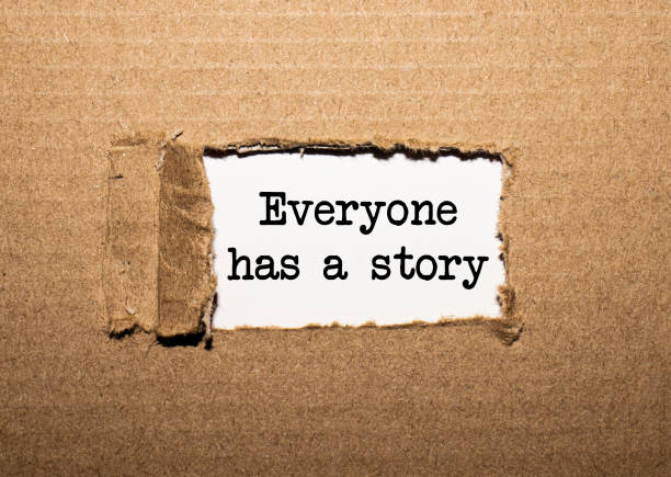istock The text everyone has a story. behind torn brown paper 1278110643