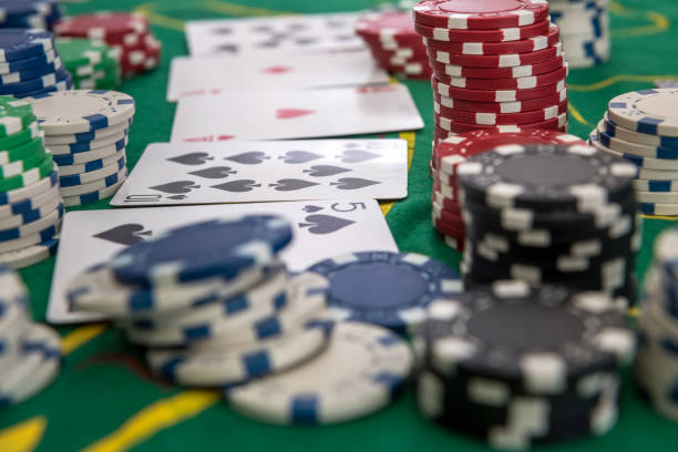 istock many poker chips with play card on casino table 1278113618