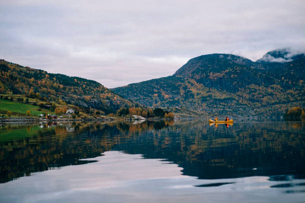 Canoeing on a fjord in autumn