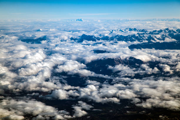 An aerial view shot from an aitplane of the European mountain range known as the Alps