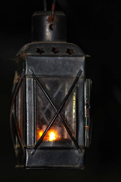 istock A Black lantern hanging and glowing 1278118950